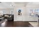 Bright foyer leading to a spacious living area with a view of the front yard at 136 Kingston Dr, Locust, NC 28097