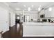 Spacious kitchen with stainless steel appliances, granite countertops, and hardwood floors at 136 Kingston Dr, Locust, NC 28097
