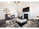 Comfortable living room with a tall ceiling, fireplace, and plush seating at 136 Kingston Dr, Locust, NC 28097