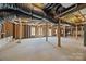 Unfinished basement awaiting customization with exposed ductwork and framing at 170 Anniston Way, Davidson, NC 28036