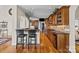 Well-equipped kitchen boasts granite countertops, custom cabinetry, and stainless steel appliances at 170 Anniston Way, Davidson, NC 28036