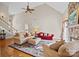 Spacious living room showcasing a high ceiling, hardwood floors, and stylish decor at 170 Anniston Way, Davidson, NC 28036