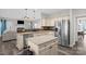 Open kitchen with stainless steel appliances, granite countertops, and kitchen island at 2010 Hollyhedge Ln, Indian Trail, NC 28079