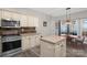 Kitchen with stainless steel appliances, granite countertops, and an island at 2010 Hollyhedge Ln, Indian Trail, NC 28079