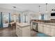 Open kitchen with stainless steel appliances, granite countertops, and views to the living room at 2010 Hollyhedge Ln, Indian Trail, NC 28079