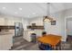 Charming kitchen featuring stainless steel appliances, granite countertops, and an island at 2010 Hollyhedge Ln, Indian Trail, NC 28079