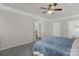 Main bedroom with neutral walls, plush carpet, and access to main bathroom at 2010 Hollyhedge Ln, Indian Trail, NC 28079