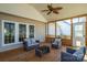 Covered back porch with outdoor furniture and a ceiling fan at 2010 Hollyhedge Ln, Indian Trail, NC 28079
