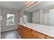 Bathroom featuring a large vanity, mirror and neutral colored walls at 2017 Bridleside Dr, Indian Trail, NC 28079