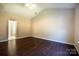 Bedroom with hardwood floors, neutral walls, and a window at 2017 Bridleside Dr, Indian Trail, NC 28079