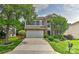 Charming two-story home featuring a well-maintained lawn, landscaped yard and an attached two-car garage at 2017 Bridleside Dr, Indian Trail, NC 28079