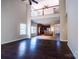 Open-concept living space with hardwood floors, high ceilings, and views into the kitchen at 2017 Bridleside Dr, Indian Trail, NC 28079