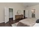 Bedroom features a dresser between two entryways: walk-in closet and ensuite bathroom at 2017 Bridleside Dr, Indian Trail, NC 28079
