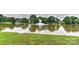 Picturesque pond with fountain, offering serene views and a tranquil setting within the community at 2017 Bridleside Dr, Indian Trail, NC 28079