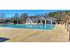 A large community pool featuring a large deck area and plenty of seating for residents to enjoy at 2017 Bridleside Dr, Indian Trail, NC 28079