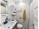 Traditional bathroom featuring a white vanity, and neutral shower curtain at 214 W Elm St, Wingate, NC 28174