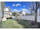Backyard with a white fence and playset on a sunny day, offering space for outdoor fun at 224 Mills Ln, Fort Mill, SC 29708