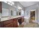 Bathroom with double vanity, soaking tub, and tile flooring at 224 Mills Ln, Fort Mill, SC 29708