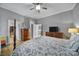 Bright bedroom with hardwood floors and connected bathrooms at 224 Mills Ln, Fort Mill, SC 29708