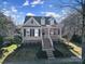 Charming two-story home featuring a welcoming front porch and well-maintained landscaping at 224 Mills Ln, Fort Mill, SC 29708
