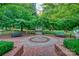 Scenic park pathway leading to a gazebo, bordered by mature trees, benches, and circular brick area at 224 Mills Ln, Fort Mill, SC 29708