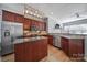 Spacious kitchen featuring stainless steel appliances, a central island, and granite countertops at 224 Mills Ln, Fort Mill, SC 29708