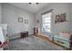 Cozy playroom filled with toys, featuring a soft carpet and ample natural light at 224 Mills Ln, Fort Mill, SC 29708
