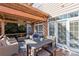 Cozy back deck features a pergola, outdoor seating, and a dining area at 2283 Iron Works Dr, Clover, SC 29710