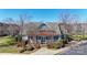 A beautiful clubhouse with copper roof, blue siding, and manicured landscaping at 2283 Iron Works Dr, Clover, SC 29710