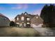 Charming brick two-story home with well-maintained landscaping and attached two-car garage at 2283 Iron Works Dr, Clover, SC 29710