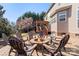 Cozy backyard features a fire pit with seating, a pergola, and a lush lawn at 2283 Iron Works Dr, Clover, SC 29710