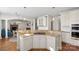 Open kitchen with granite countertops, stainless steel appliances, and white cabinets at 2283 Iron Works Dr, Clover, SC 29710