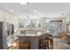 An eat-in kitchen features granite countertops, stainless appliances, a breakfast bar, and a bay window at 2283 Iron Works Dr, Clover, SC 29710
