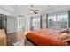 Bright main bedroom with hardwood floors and an en suite bathroom featuring a soaking tub and separate shower at 2283 Iron Works Dr, Clover, SC 29710