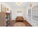 Cozy home office with hardwood floors, a comfortable leather couch, and a large window at 2283 Iron Works Dr, Clover, SC 29710