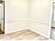 Cozy bedroom with vinyl floors and neutral walls, offering a serene atmosphere at 2314 Knickerbocker Dr, Charlotte, NC 28212