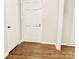 Welcoming entryway featuring a white door and beautiful hardwood floors at 2314 Knickerbocker Dr, Charlotte, NC 28212