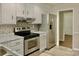 Updated kitchen with stainless steel appliances, bright lighting, and modern design at 2314 Knickerbocker Dr, Charlotte, NC 28212