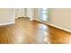 Spacious living room with polished hardwood floors and a sunlit ambiance at 2314 Knickerbocker Dr, Charlotte, NC 28212