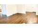 Bright and airy living room featuring hardwood floors, neutral paint, and classic trim at 2314 Knickerbocker Dr, Charlotte, NC 28212