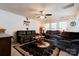 Comfortable living room with plush seating, a ceiling fan, and western-themed decorations at 236 17Th Se Ave, Hickory, NC 28602