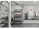 Community gym featuring free weights, exercise machines and ample workout space at 2401 Euclid Ave # 213, Charlotte, NC 28203