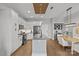 A wide kitchen view includes an island, stainless appliances, dining nook, and modern cabinetry at 2401 Euclid Ave # 213, Charlotte, NC 28203