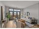 Bright living area with balcony access, hardwood floors, comfortable seating, and stylish decor for relaxation at 2401 Euclid Ave # 213, Charlotte, NC 28203
