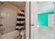 Bathroom with shower, bathtub, toilet and floral shower curtain at 241 Catoctin Rd, Rock Hill, SC 29732