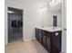 Bathroom featuring double vanity sinks, tile flooring, and a walk-in closet at 241 Catoctin Rd, Rock Hill, SC 29732
