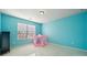 Bright bedroom with blue walls, large window, and a charming play tent at 241 Catoctin Rd, Rock Hill, SC 29732