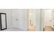 Bright bedroom featuring a closet and an ensuite bathroom that includes a tiled shower at 241 Catoctin Rd, Rock Hill, SC 29732
