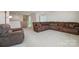 Inviting bonus room featuring comfortable sofas and ample space for entertaining at 241 Catoctin Rd, Rock Hill, SC 29732