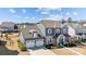 Stunning two-story home with a three-car garage, manicured landscaping, and elegant architectural details at 2419 Paddlers Cove Dr, Clover, SC 29710